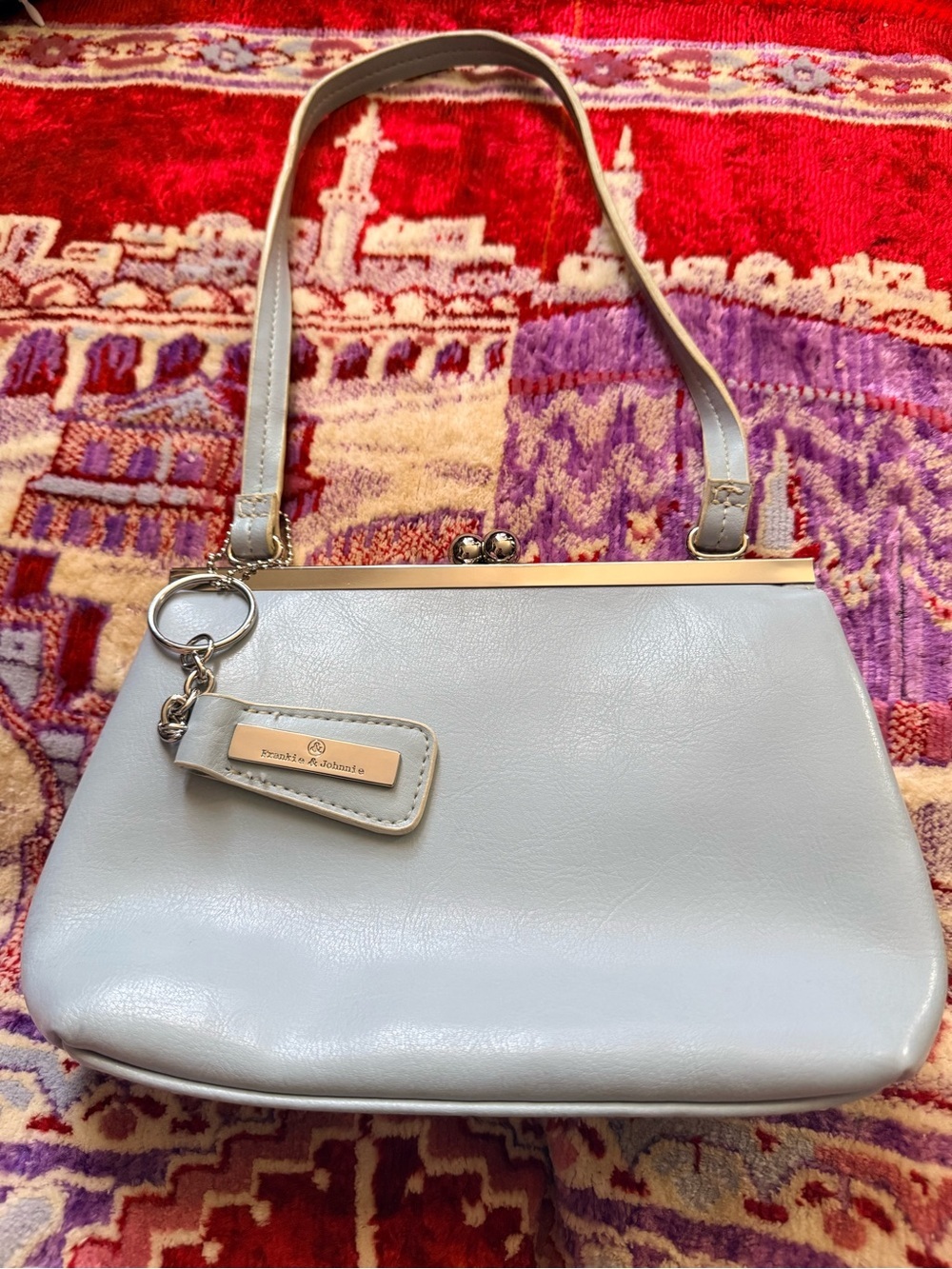 Classic Pale Blue Shoulder Bag with Kiss-Lock Frame and Detachable Charm